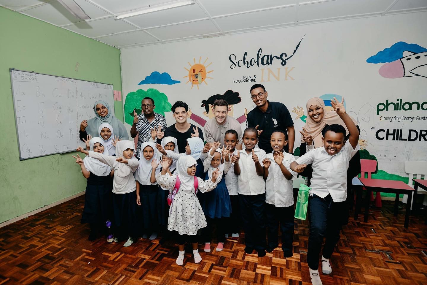 Ben Parker and the Parker B Associates team volunteering with a children's education charity